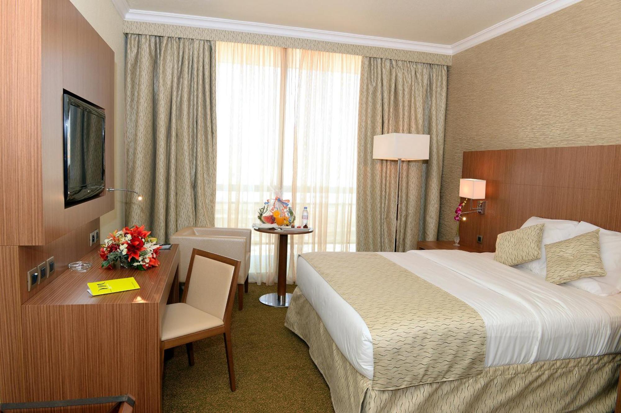 Quarto com Cama Queen-Size e Varanda